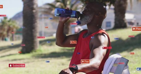 Senior man drinking water on park bench after workout with social media overlays