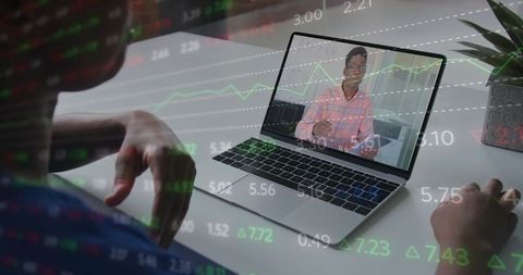 Conducting remote finance meeting on laptop with double-exposure stock charts and analytics