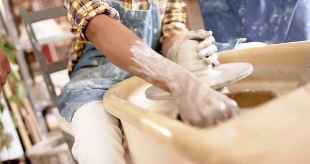 Close-up of Potter Working on Wheel in Pottery Studio - Download Free Stock Images Pikwizard.com