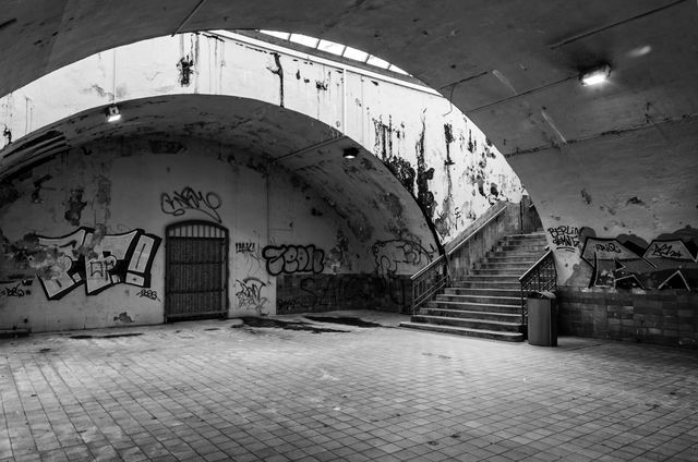 Deserted Urban Tunnel with Graffiti and Decayed Walls - Download Free Stock Images Pikwizard.com
