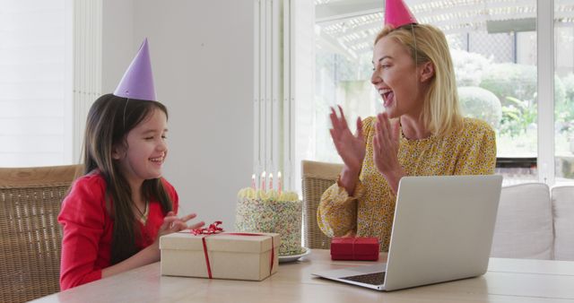 Mother and Daughter Celebrating Virtual Birthday Party with Gifts and Cake - Download Free Stock Images Pikwizard.com