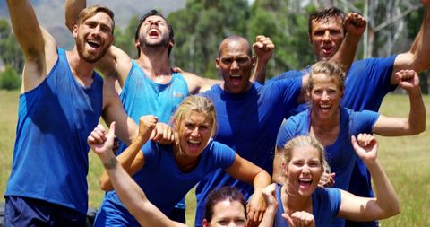 Diverse Team Celebrating Victory Outdoors with Enthusiasm - Download Free Stock Images Pikwizard.com
