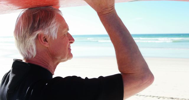 Senior Surfer Holding Surfboard and Looking at Ocean - Download Free Stock Images Pikwizard.com