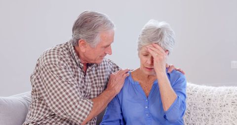 Elderly Couple Support and Comfort in Living Room - Download Free Stock Images Pikwizard.com