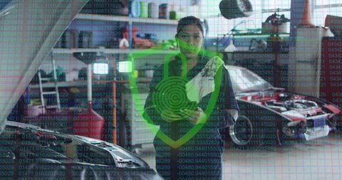 Female Mechanic Using Tablet with Digital Security Overlay - Download Free Stock Images Pikwizard.com