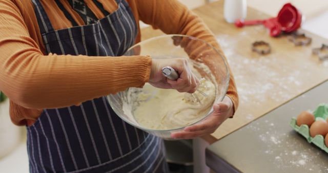 Person Whisking Batter in Kitchen Preparing for Baking - Download Free Stock Images Pikwizard.com