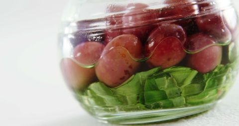 Fresh ingredients jar with green vegetables and red beans