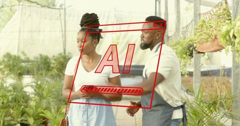 Couple browsing greenhouse nursery choosing seedlings for home gardening and sustainable living