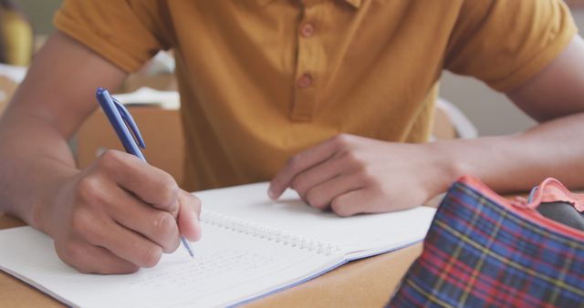 Student Writing in Notebook During Study Session - Download Free Stock Images Pikwizard.com