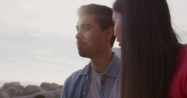 Young Couple Enjoying Scenic Beach Sunset Together - Download Free Stock Images Pikwizard.com