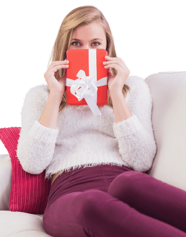 woman relaxing on sofa with gift, peeking over romantic package - Download Free Stock Videos Pikwizard.com