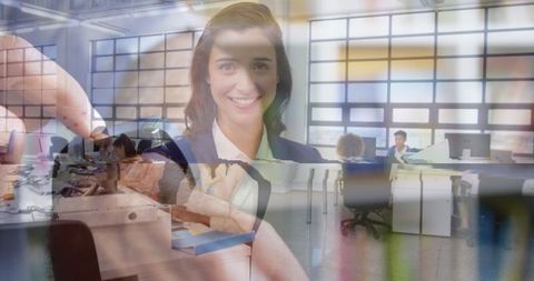 Businesswoman with smartwatch technology overlay and office scene