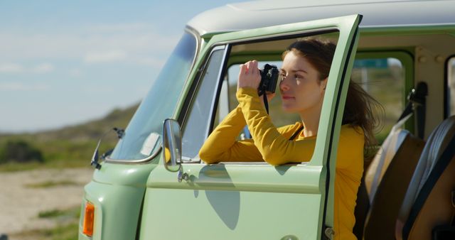 Woman Taking Photos from Vintage Camper Van during Road Trip - Download Free Stock Images Pikwizard.com