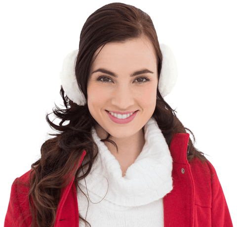 Cheerful brunette wearing earmuffs with red jacket transparent background