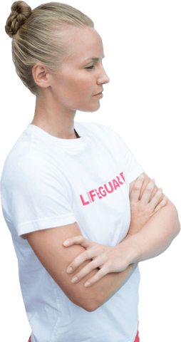 Confident female lifeguard with crossed arms in transparent background