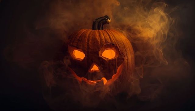 Glowing Jack-o'-Lantern Surrounded by Spooky Smoke