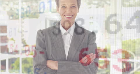 Smiling Businesswoman with Stock Market Overlay in Modern Office