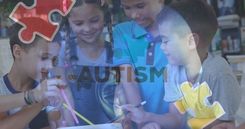 Children engaging with technology advocating autism awareness