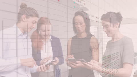 Diverse Business Team Analyzing Data on Digital Devices