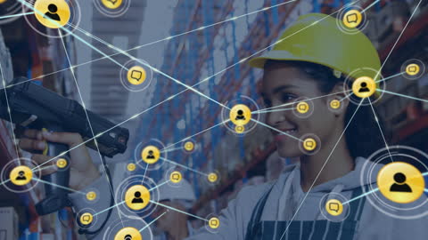 Biracial Worker Using Technology in Modern Warehouse