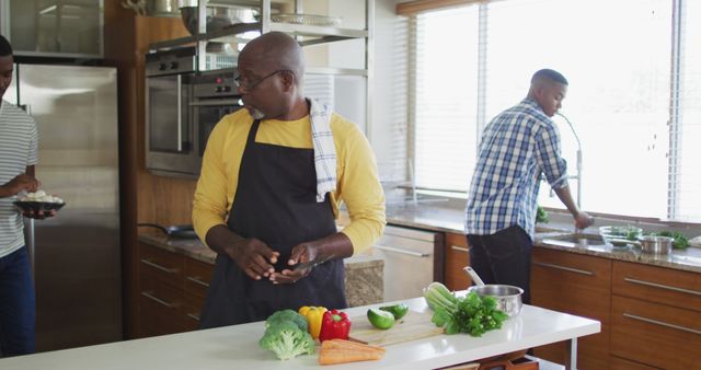 Family Preparing Fresh Vegetables in Modern Kitchen - Download Free Stock Images Pikwizard.com