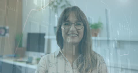 Smiling Woman and Industry Data Visualization in Office Setting