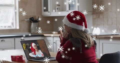 Virtual Christmas Celebration with Festive Santa Hats and Snow Effects