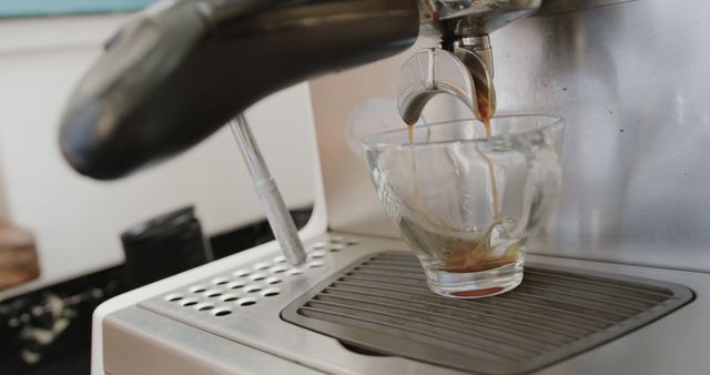 Close-Up of Espresso Machine Pouring Coffee into Cup - Download Free Stock Images Pikwizard.com