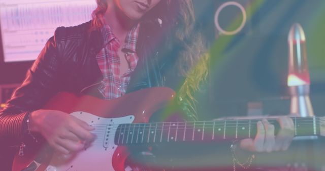 Female Guitarist Creating Vibrant Music in Studio - Download Free Stock Images Pikwizard.com