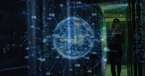 Futuristic it specialist analyzing holographic earth in server room