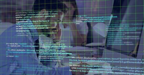 Software Developers Reviewing Code on Modern Workstation