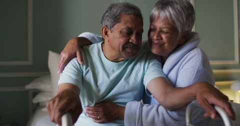 Senior Couple Embracing with Love and Support at Home - Download Free Stock Images Pikwizard.com