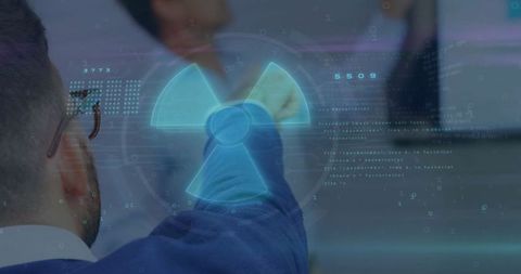 Businessman Interacting with Virtual Radiation Symbol Hologram in Futuristic Office