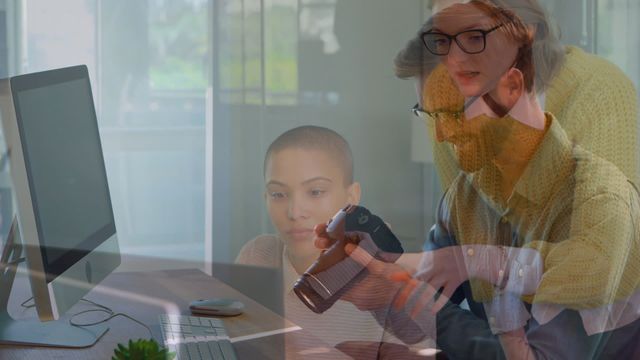 This image depicts a creative concept of business professionals collaborating both in an office with technology and photography. The overlay effect highlights teamwork and diversity among colleagues. Suitable for articles and promotional material on creative workplaces, team meetings, innovative problem-solving techniques, and modern business environments.