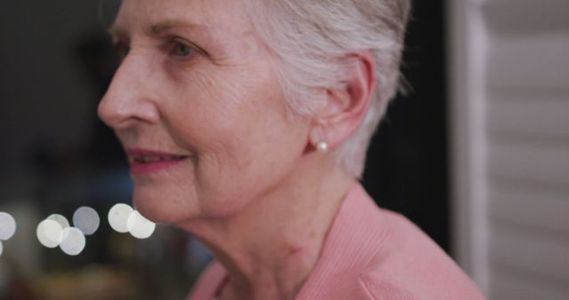 Smiling Senior Woman with Short Gray Hair at Night Indoors - Download Free Stock Images Pikwizard.com