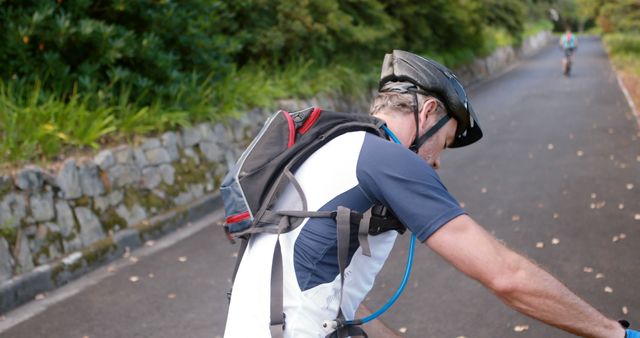 Cyclist Resting During Outdoor Bike Ride - Download Free Stock Images Pikwizard.com