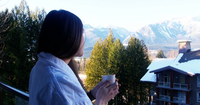 Woman Relaxing on Balcony with Mountain Views - Download Free Stock Images Pikwizard.com