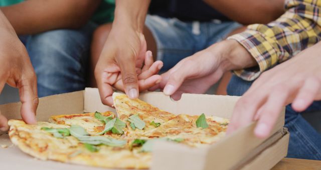 Friends are sharing and enjoying a freshly baked pizza. This is a perfect depiction of togetherness and casual dining. Great for themes about social gatherings, friendship, food sharing moments, and group activities. It can be used in advertisements for food delivery services, social networks, and community events.