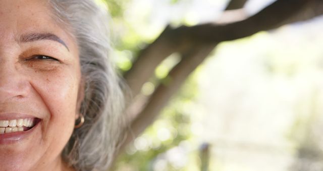 Happy Elderly Woman Laughing Outdoors in Nature - Download Free Stock Images Pikwizard.com