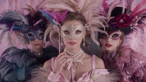 Ornate Masquerade Mask Trio in Luxurious Setting
