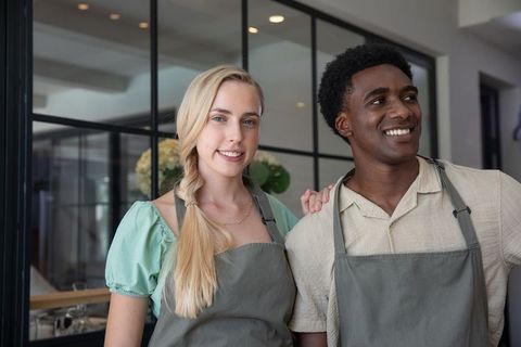 Diverse Coworkers in Coffee Shop Collaboration