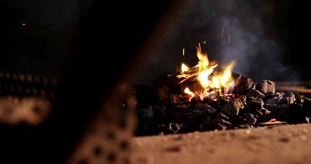 Burning fire at fireplace for blacksmith work in workshop 4k