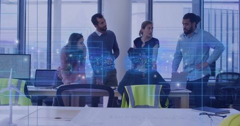 Engineering team reviewing renewable energy blueprints in modern office with hud overlay