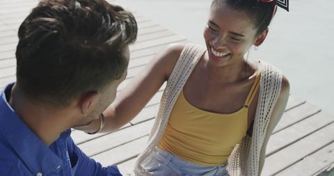 Happy Couple Relaxing on Sunny Beach Wooden Dock