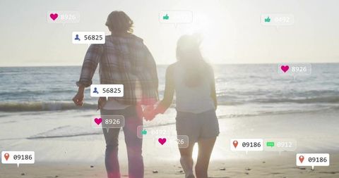 Romantic Couple Strolling Hand in Hand on Beach during Sunset with Social Media Icons