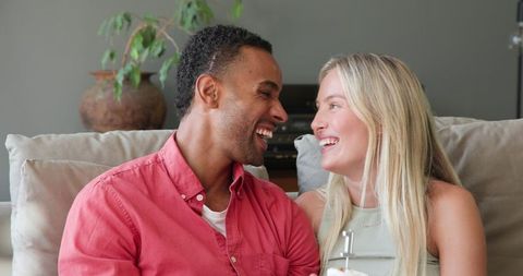 Happy Couple Celebrating Special Occasion at Home