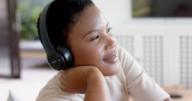 Woman Relaxing with Headphones, Listening to Music - Download Free Stock Images Pikwizard.com