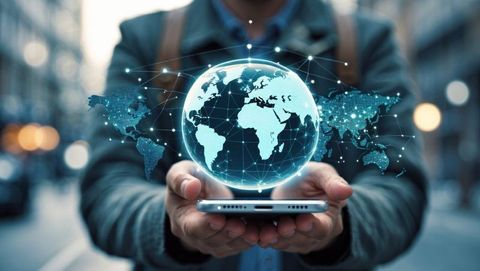 Futuristic Connectivity: Man Holding Smartphone Displaying Globe - Download Free Stock Images Pikwizard.com