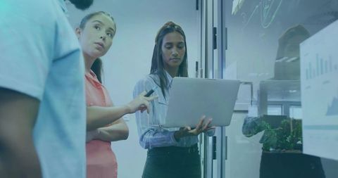 Team Collaborating on Data Visualization in Modern Office