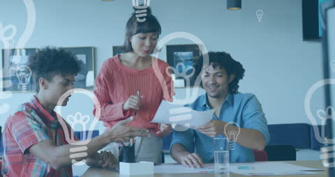 Diverse Team Discussing Innovation with Light Bulb Icons Overlay